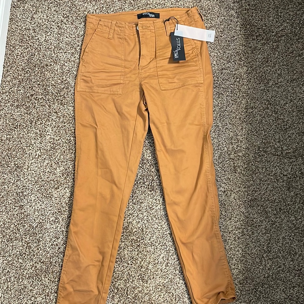 Never worn camel colored stitch and star pants